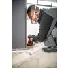 Broušení betonové podlahy u stěny sanační bruskou FLEX LDE 16-8 125 R